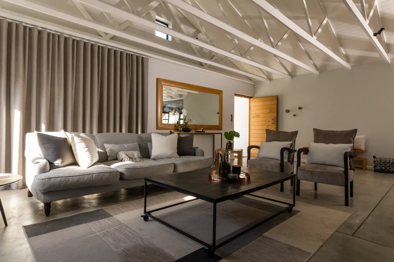 sofa-and-armchairs-by-center-table-in-living-room-2025-04-03-11-37-17-utc.webp